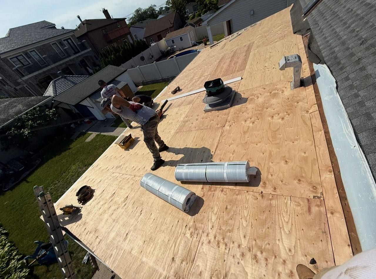 Flat roof with skylights and solar fan - in progress