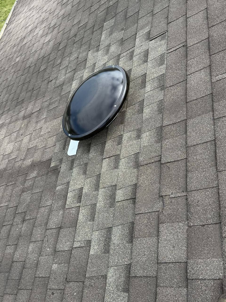 Solar attic fan on a new roof